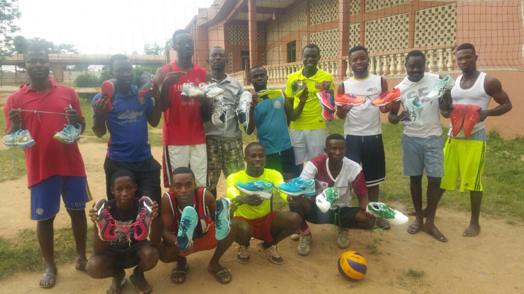 Students receiving shoes in The Gambia
